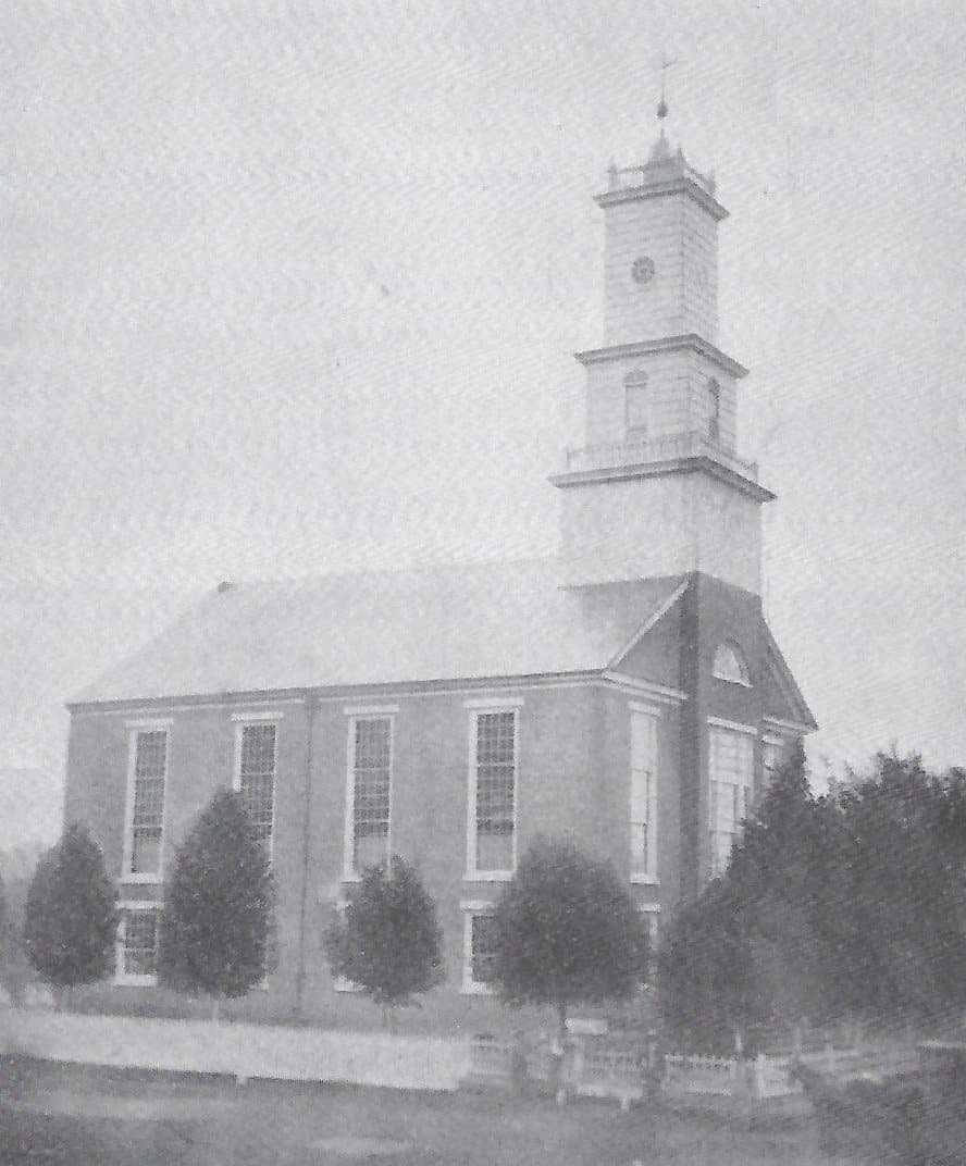 The 1851 building around 1866, with its first steeple